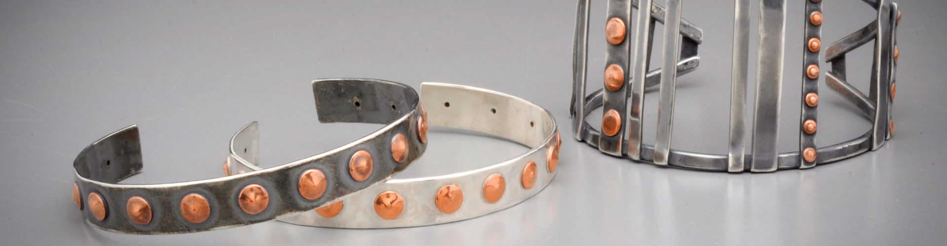 Silver Bracelets With Copper Rivets